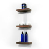 Plank is a wall mounted three product shelf unit with laminate clad wood shelves. Showcase, promote and sell salon product from your stylist stations. Shown in Jurassic Ebony.